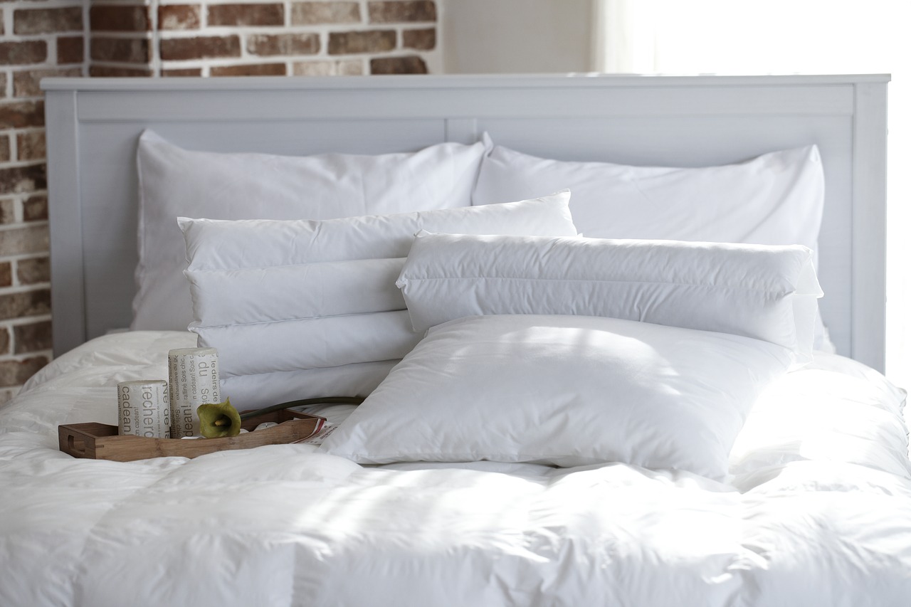 white bed and pillows